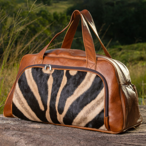 Genuine leather and zebra hair on hide travel bag.