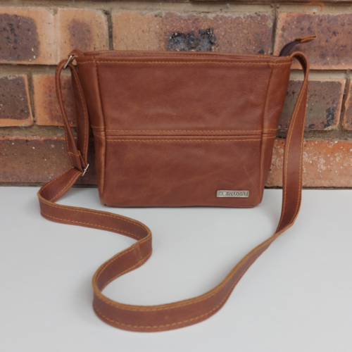 Small leather sling bag