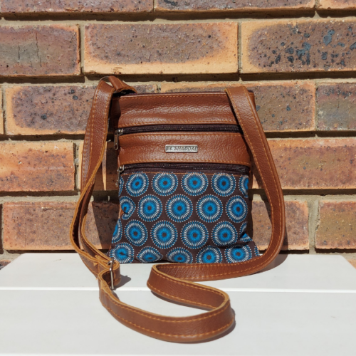 Genuine leather sling bag with Shweshwe fabric