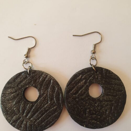Round leather on wood earrings.