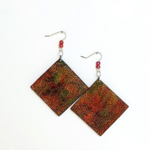 Leather and wood earrings.