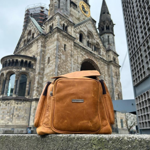 Genuine leather tourist backpack.