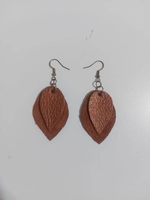 Rose gold leaf shape leather earrings.