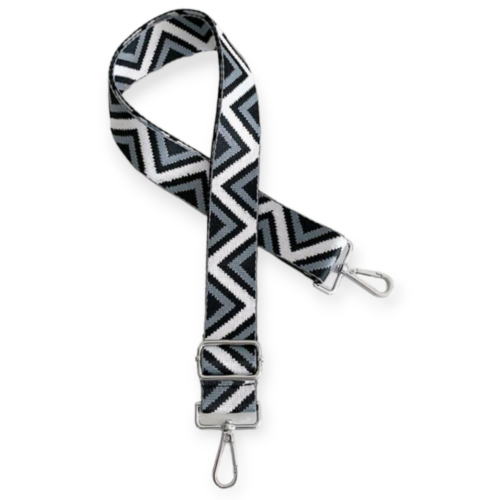 Bag strap with black, grey and white zig zag stripes