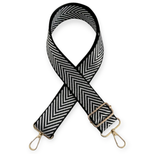 Bag strap with black and white stripes